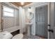 Clean bathroom with white subway tile, clawfoot tub, and pedestal sink at 5901 N Cherokee Ave, Tampa, FL 33604