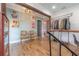 Upstairs hallway with unique artwork and built-in shelving at 5901 N Cherokee Ave, Tampa, FL 33604