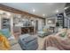 Living area with open concept kitchen and spiral staircase at 5901 N Cherokee Ave, Tampa, FL 33604