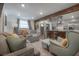 Living room with comfortable seating and view into the kitchen at 5901 N Cherokee Ave, Tampa, FL 33604