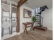 Spiral staircase and landing area with wooden accents at 5901 N Cherokee Ave, Tampa, FL 33604