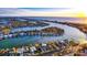 Aerial view showcasing waterfront property and community at 6 Treasure Ln, Treasure Island, FL 33706