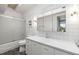 Clean bathroom with white tile and modern vanity at 6 Treasure Ln, Treasure Island, FL 33706