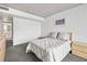 Bright bedroom with light wood furniture and carpet flooring at 6 Treasure Ln, Treasure Island, FL 33706