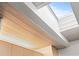 High ceiling with skylights and wood paneling at 6 Treasure Ln, Treasure Island, FL 33706
