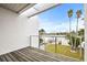 Private deck with water views and wooden flooring at 6 Treasure Ln, Treasure Island, FL 33706