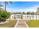 Private dock with boat lift and access to the water at 6 Treasure Ln, Treasure Island, FL 33706