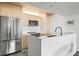 Contemporary kitchen featuring stainless steel appliances and white cabinets at 6 Treasure Ln, Treasure Island, FL 33706