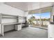 Modern office with water views and built-in shelving at 6 Treasure Ln, Treasure Island, FL 33706