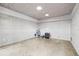 Unfinished storage room with concrete floor at 6 Treasure Ln, Treasure Island, FL 33706