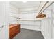 Spacious walk-in closet with ample shelving and hanging space at 6 Treasure Ln, Treasure Island, FL 33706