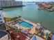 Relaxing waterfront pool with patio area at 6020 Shore Blvd S # 109, Gulfport, FL 33707