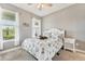 Bedroom with neutral walls, white trim, and carpeted floor at 6028 Milestone Dr, Apollo Beach, FL 33572