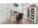 Bright office with desk, computer, natural light, and plenty of storage at 6028 Milestone Dr, Apollo Beach, FL 33572