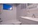 Clean bathroom, white vanity, shower/tub combo at 6153 9Th Ave, New Port Richey, FL 34653