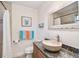 Modern bathroom with updated fixtures and a vessel sink at 8829 Bay Pointe Dr # 205, Tampa, FL 33615