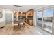 Modern kitchen with granite countertops, stainless steel appliances, and island at 8829 Bay Pointe Dr # 205, Tampa, FL 33615