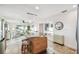 Kitchen island with granite countertop, offering additional prep space at 8829 Bay Pointe Dr # 205, Tampa, FL 33615