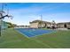 Community tennis court with basketball court at 8829 Bay Pointe Dr # 205, Tampa, FL 33615