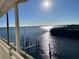 Stunning water view from balcony, showcasing the waterway and distant horizon at 8829 Bay Pointe Dr # 205, Tampa, FL 33615
