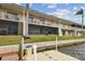 Back exterior view of condo building with private boat dock at 8829 Bay Pointe Dr # 205, Tampa, FL 33615