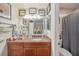 Guest bathroom with granite countertop and shower/tub combo at 9209 Seminole Blvd # 209, Seminole, FL 33772