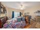 Bedroom with ceiling fan, currently used for storage at 9209 Seminole Blvd # 209, Seminole, FL 33772