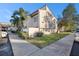 Exterior view of condo with landscaped grounds at 9209 Seminole Blvd # 209, Seminole, FL 33772