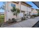 Landscaped front yard with decorative accents at 9209 Seminole Blvd # 209, Seminole, FL 33772