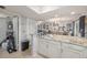 Open kitchen with granite counters, offering views into dining area at 9209 Seminole Blvd # 209, Seminole, FL 33772