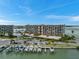 Condo building, marina, and boat slips at 1 Key Capri # 112E, Treasure Island, FL 33706