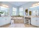 Elegant bathroom with a large soaking tub and double vanities at 1005 Ketzal Dr, Trinity, FL 34655