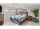 Guest bedroom with queen-size bed and stylish decor at 1217 De Narvaez Ave, Bradenton, FL 34209