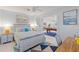 Bedroom with pool table view, featuring a comfy bed and workspace at 1217 De Narvaez Ave, Bradenton, FL 34209