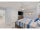 Serene bedroom with king bed, large TV, and walk-in closet at 1217 De Narvaez Ave, Bradenton, FL 34209