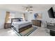 Spacious bedroom with king-size bed, dresser, and workspace at 1217 De Narvaez Ave, Bradenton, FL 34209