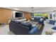 Spacious living room with comfortable seating and access to backyard at 1217 De Narvaez Ave, Bradenton, FL 34209