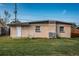 Backyard view of house, with lawn and shed at 12755 62Nd N St, Largo, FL 33773