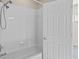 Clean bathroom with white tiled shower/tub combo at 14545 Mirabelle Vista Cir, Tampa, FL 33626
