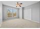 Spacious bedroom with carpet flooring and double door closet at 14545 Mirabelle Vista Cir, Tampa, FL 33626