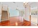 Bright dining room with hardwood floors and access to kitchen at 14545 Mirabelle Vista Cir, Tampa, FL 33626
