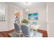 Bright dining room with hardwood floors and a chandelier at 14545 Mirabelle Vista Cir, Tampa, FL 33626