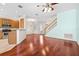 Open concept kitchen with stainless steel appliances and hardwood floors at 14545 Mirabelle Vista Cir, Tampa, FL 33626