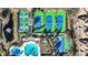 Aerial view of tennis and pickleball courts near pool at 14545 Mirabelle Vista Cir, Tampa, FL 33626