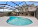 Relaxing pool and patio area with covered enclosure at 16013 Eagle River Way, Tampa, FL 33624