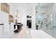 Spa-like bathroom with soaking tub, walk-in shower, and modern vanity at 17059 Dolphin Dr, North Redington Beach, FL 33708