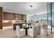 Open concept dining area and kitchen with modern design at 17059 Dolphin Dr, North Redington Beach, FL 33708