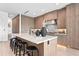 Modern kitchen with wood cabinetry, marble countertops, and high-end appliances at 17059 Dolphin Dr, North Redington Beach, FL 33708