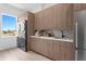 Laundry room with washer, dryer, and ample counter space at 17059 Dolphin Dr, North Redington Beach, FL 33708