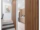 Stylish laundry room with modern cabinetry and appliances at 17059 Dolphin Dr, North Redington Beach, FL 33708